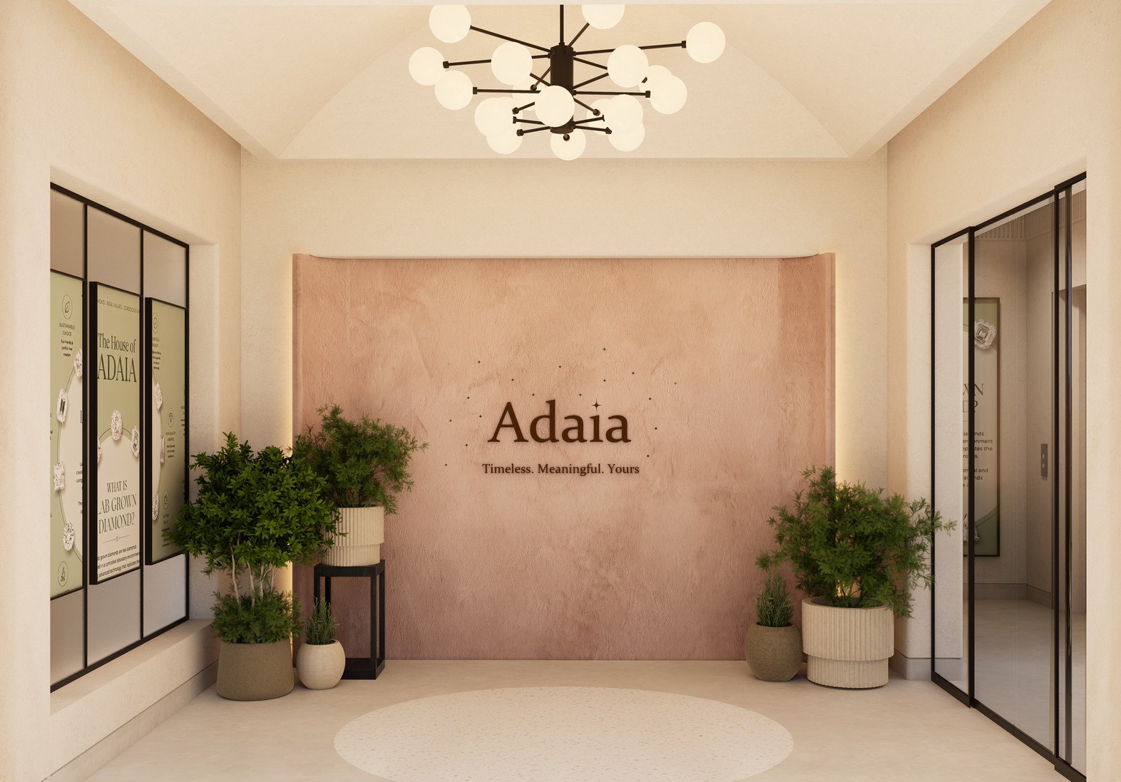 The foyer on the ground floor: the Adaia wall in rose plaster under a chandelier of glass globes, planted pots either side