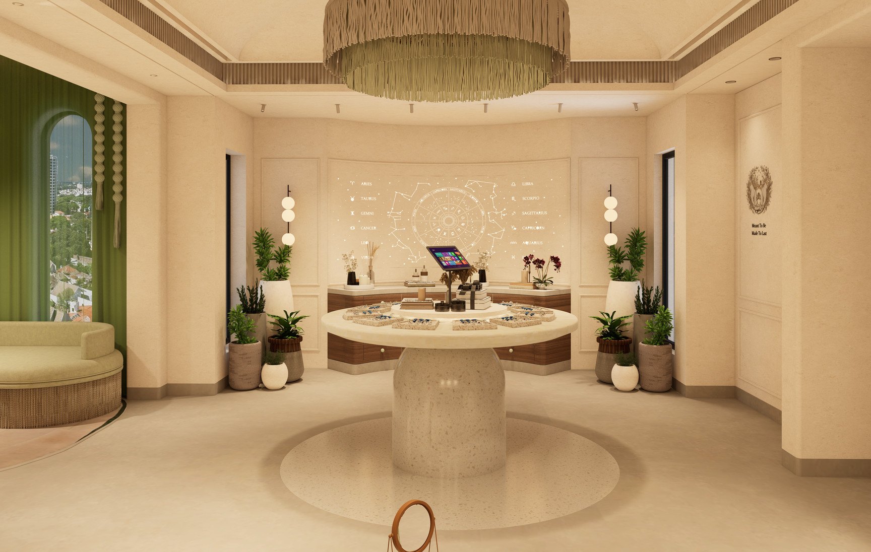 The store on the first floor, seen entire: the round display table under the fringed pendant, the curved counter and the constellation wall behind it, the green lounge to the left